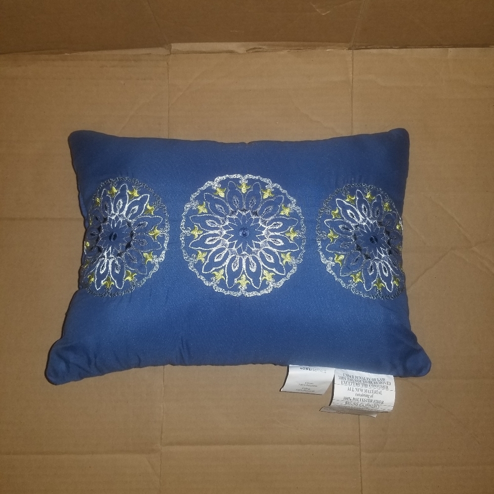 Blue pillow new never used  12" by 16"